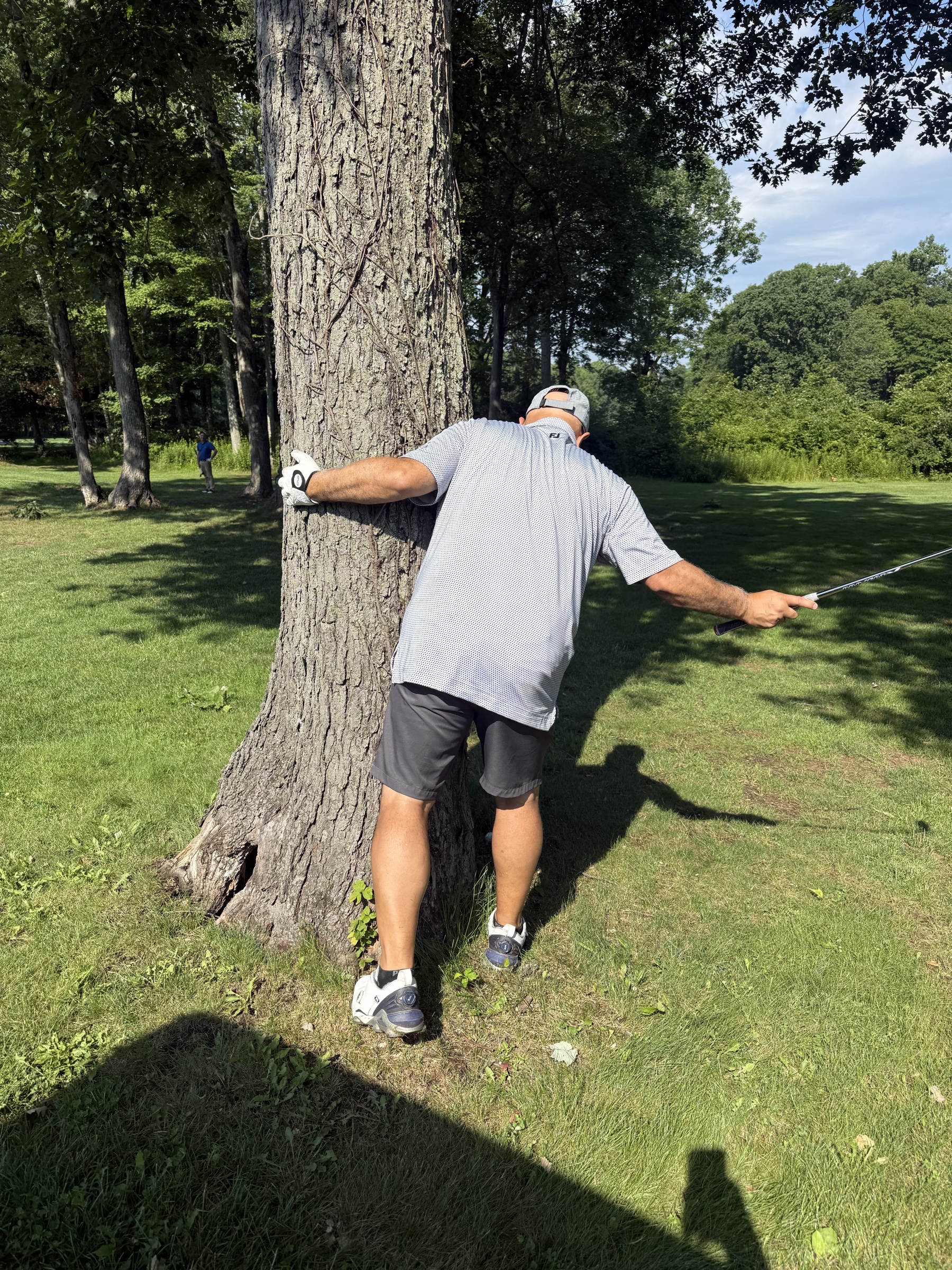 Frank hitting behind a tree